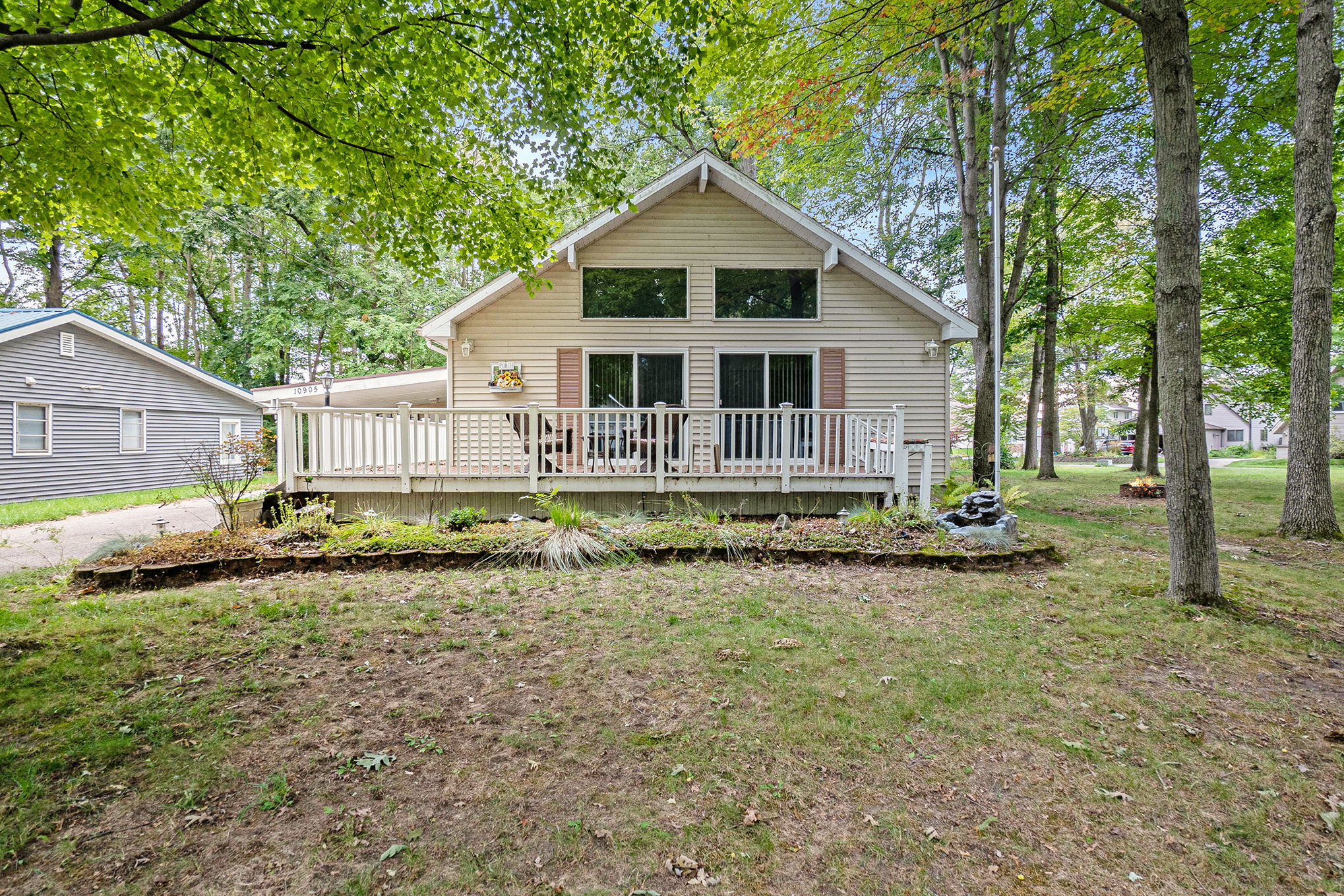 Canadian Lakes home for sale chalet style exterior